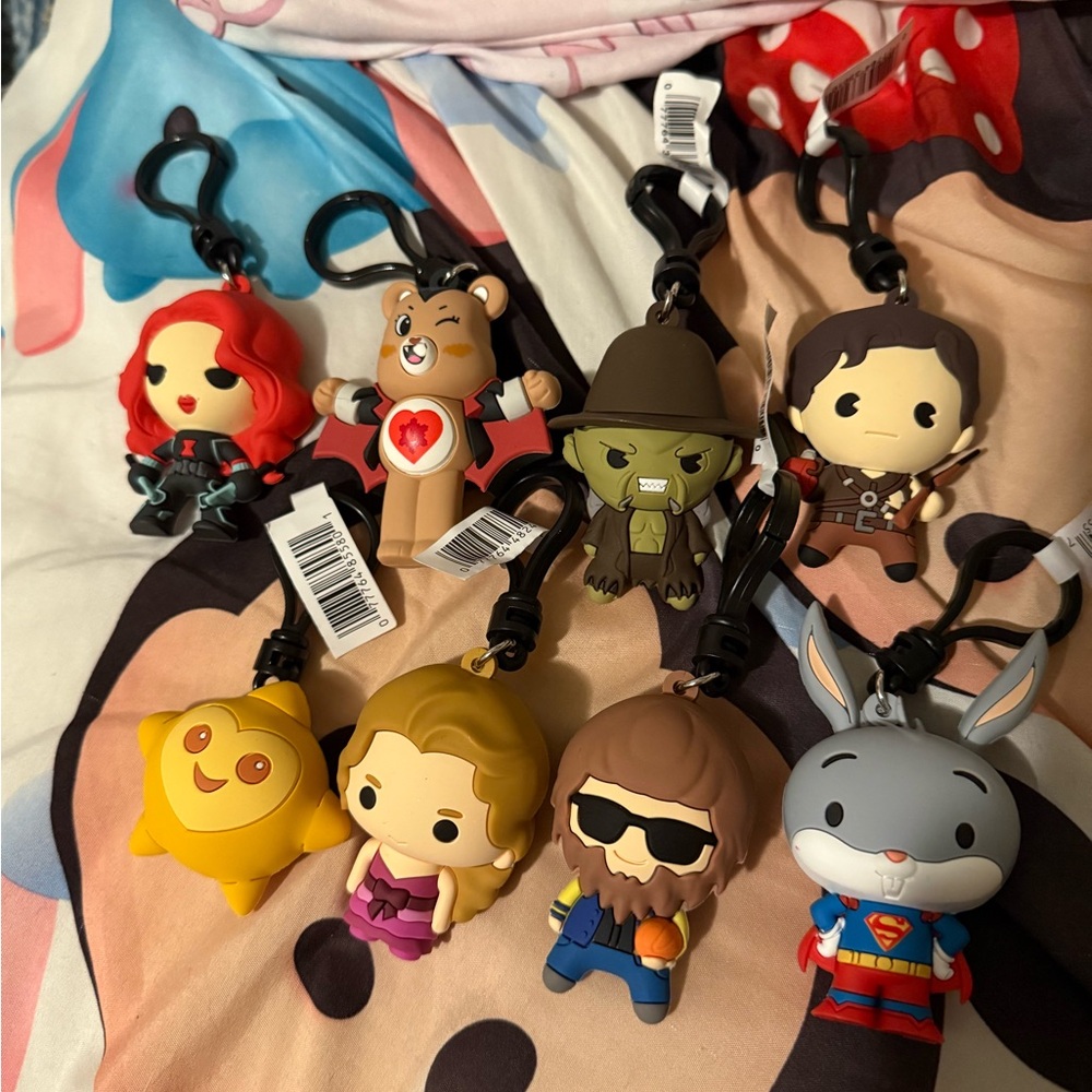 bundle of figural bag clips, mystery keychains